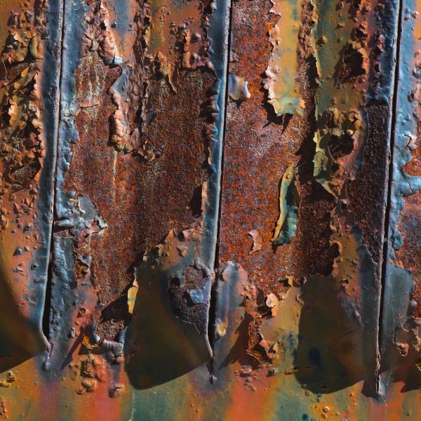 Details of rust and paint on metal.