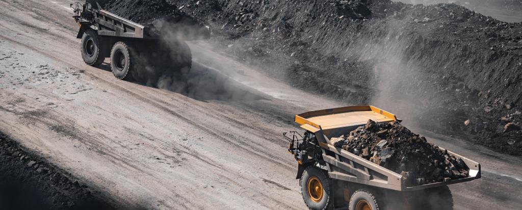 mining trucks creating dust