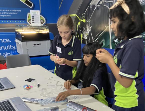 Girls working on a 3D design together